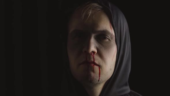 Man Vampire Halloween Makeup and Costume, Guy with Blood on His Face alt