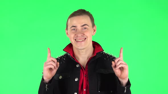 Guy Pointing Up Fingers and Shows Thumb Like. Green Screen alt