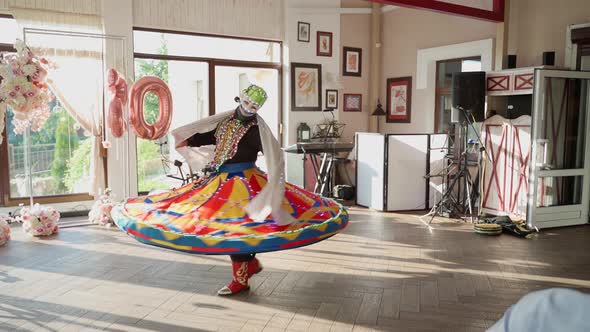 Man in mask show traditional arabic egypt performance entertainment at event. Unrecognizable person alt