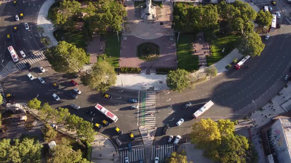 Tilt down aerial of busy roundabout in Buenos Aires alt