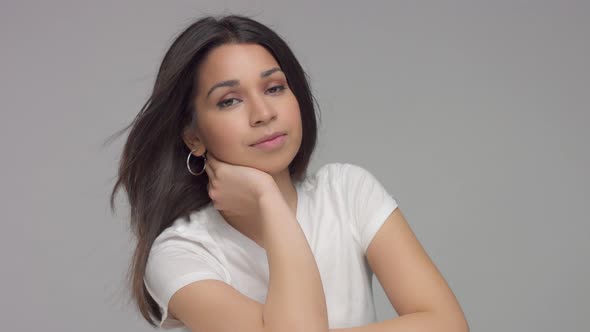 Young Mixed Race Woman in Studio in Casual Look