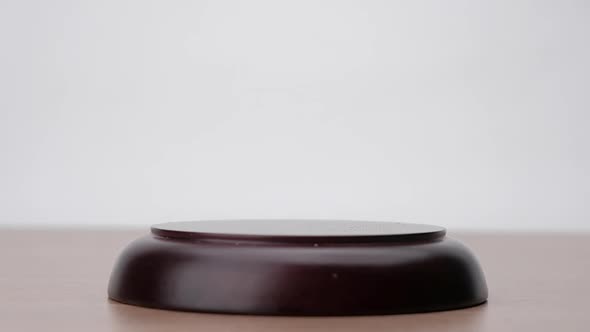 Slow motion, Gavel being struck to decide an auction or guilty verdict in court. alt