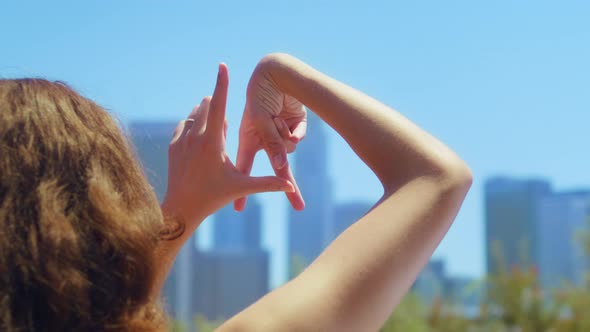 Unknown Girl Showing Sign LA By Fingers Closeup alt
