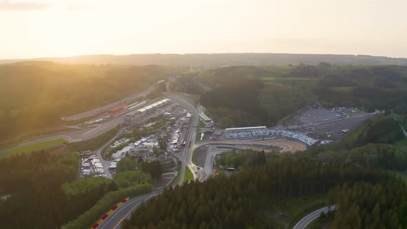 Aerial view above sunrise woodland countryside Circuit De spa-Francorchamps racetrack Stavelot Belgi alt