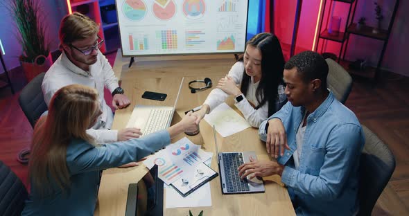 Men and Women Greeting Each other with Handshakes After Successful Finished alt