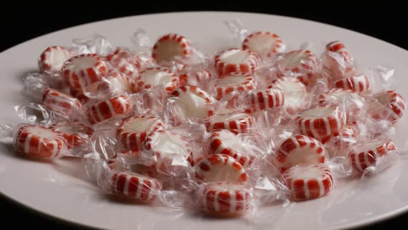 Rotating shot of peppermint candies - CANDY PEPPERMINT 014 alt