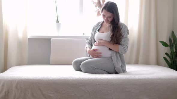 Pregnancy Motherhood People Expectation Concept Happy Pregnant Woman Touching Her Tummy in Bed at