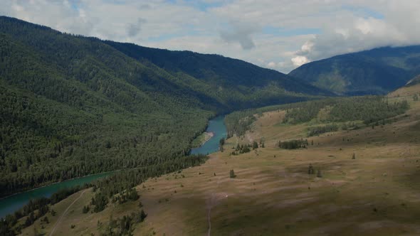 Blue Katun river in the middle of mountains of Ak-Kem valley in Altai