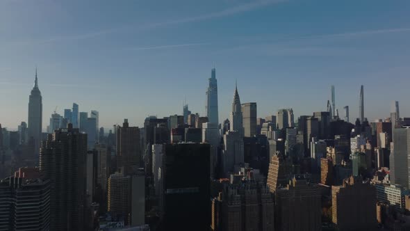 Forwards Fly Above High Rise Buildings in Midtown alt