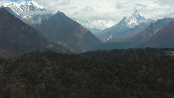 Ama Dablam and Taboche Mountains at Sunny Day, Himalaya, Nepal, Aerial View alt