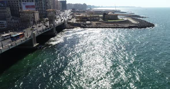 Aerial Drone Shot over Egypt Alexandria streets Stanly Bridge