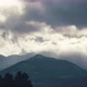 The Cayambe Mountain during a cloudy day as seen from Quitsato Sundial (medium shot) - VideoHive Item for Sale