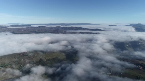 Clouds and Blue Sky Seen From Plane alt