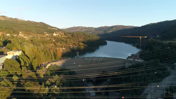 Electric Transmission Station with Metal Poles and Electrical Wires alt