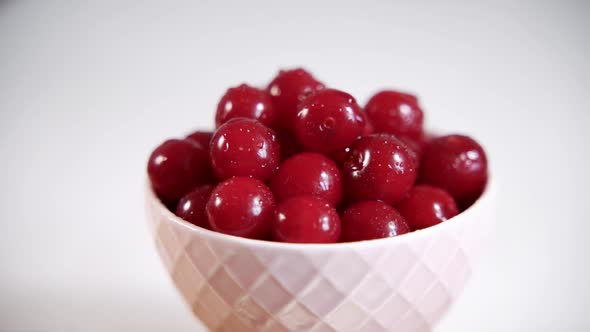 Ripe Red Cherries on Round Plate