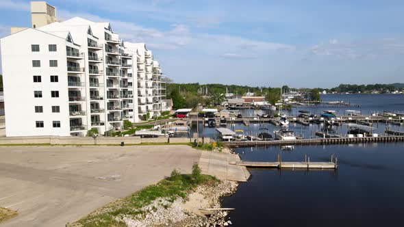 Gimbal spine and rise to show off the apartments and Boat launch of baclom's Cove. alt