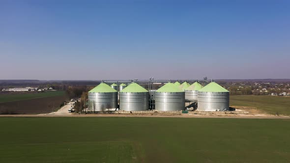 Aerial View of the Grain Silo's Elevator Near the Fields in Spring
