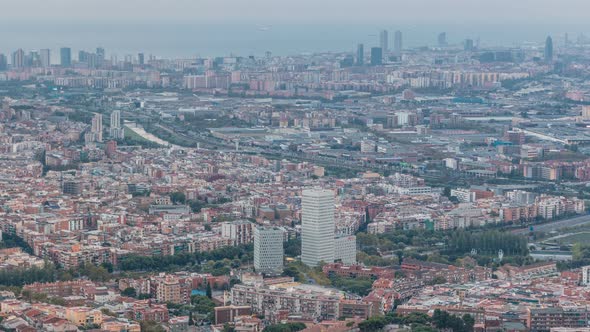 Barcelona and Badalona Skyline with Roofs of Houses and Sea on the Horizon at Evening Timelapse alt
