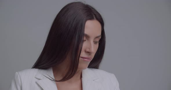 The Beautician Wears Black Gloves For Examination  alt