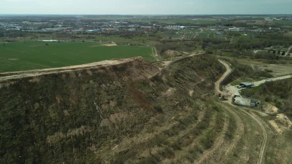 Conserved landfill for household waste. A mound of rubbish. Aerial photography. alt