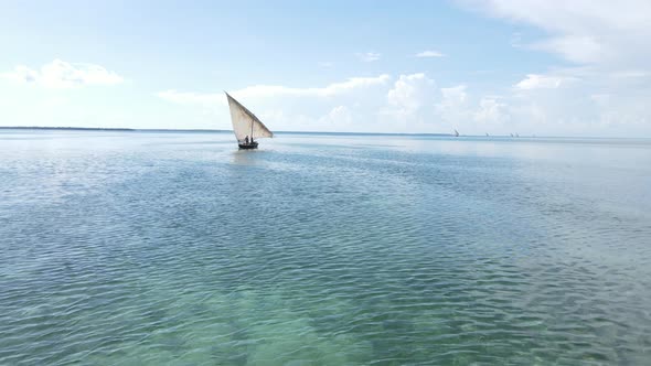 Boats in the Ocean Near the Coast of Zanzibar Tanzania Slow Motion alt