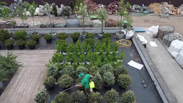 aerial view of garden shop. working people. potted plants