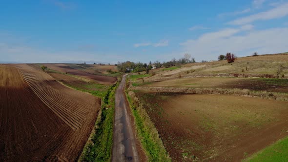 A flight over cultivated fields. alt