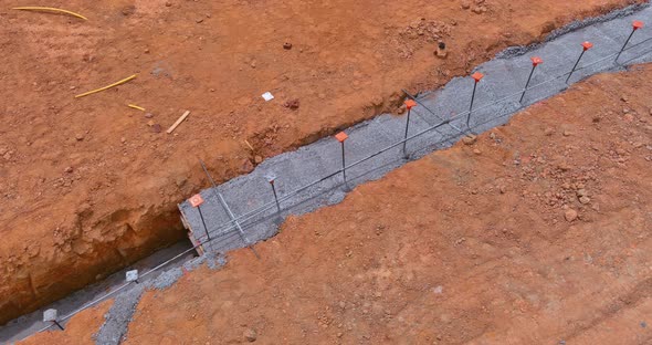 Construction of Strip Foundation Reinforcement Frame on Reinforced Concrete Structure of House alt
