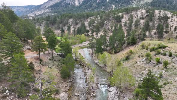 Mountain river high in the mountains aerial view 4 K alt