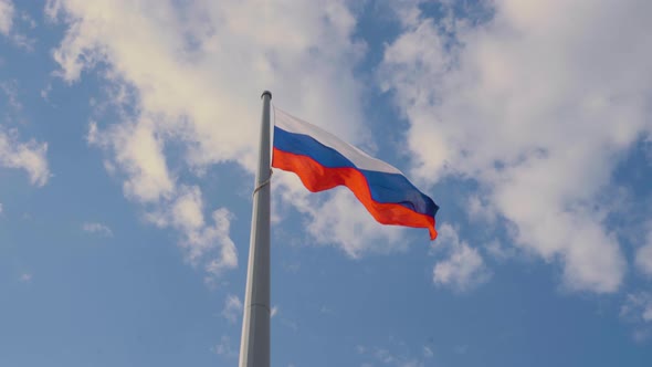 The Beautiful Flag of Russian Federation Flutters in the Wind Closeup