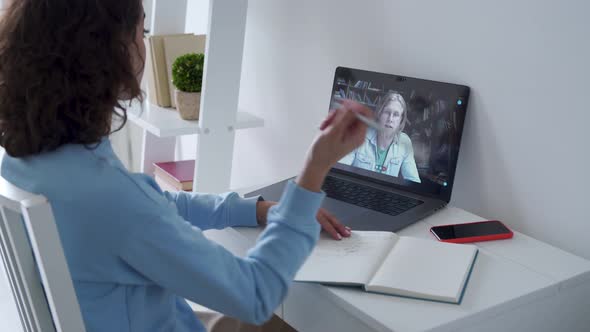 Hispanic Teen School Girl Student Distance Learning Online Lesson on Video Call