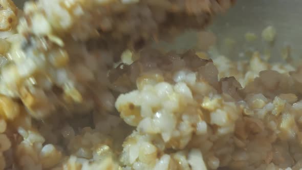 Closer Look of the Buckwheat Porridge Being Mixed
