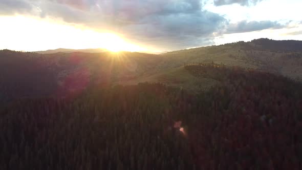 Sunset Over Mountains With Forest, Drone Shot