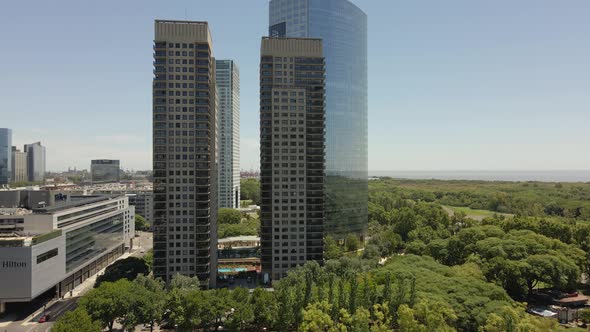 Aerial view Puerto Madero downtown district modern urban skyscraper cityscape orbit right alt