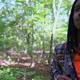Content Young African American Man Standing in a Forest - VideoHive Item for Sale