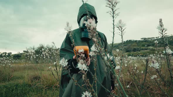 Military Walking with Geiger Counter in a Contaminated Field alt