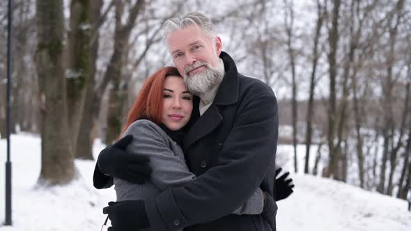 Portrait of an adult respectable man and a young woman. Family couple alt