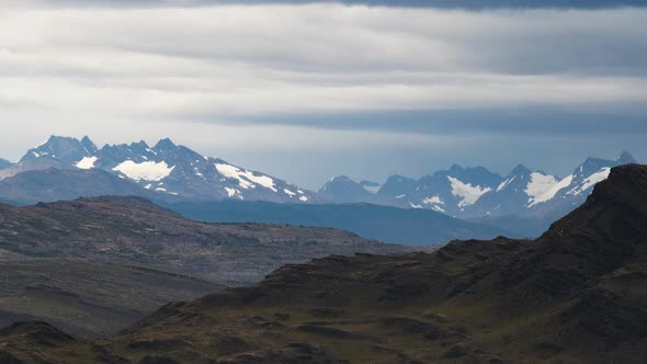 Torres del Paine, Chile, Timelapse - The mountains of the national park during a cloudy day