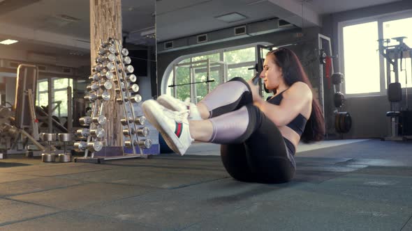 Beautiful Athletic Girl Doing Abdominal Exercises. Concept Fitness Workout Weight Loss