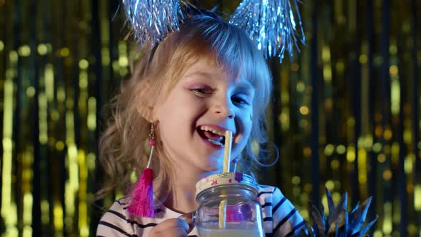 Trendy Stylish Child Kid with Pineapple Fruit Drinking Juice in Futuristic Club with Neon Light alt