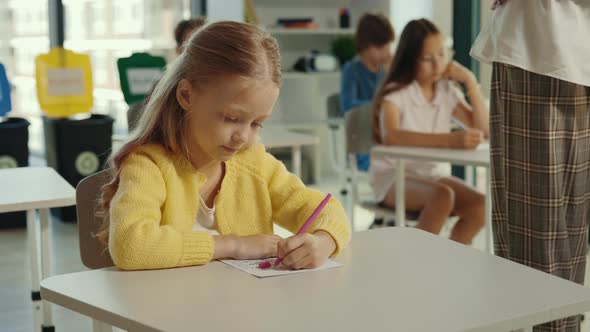 Beautiful Longhaired Blonde Pupil Sits at a Desk at School and Fills Out Tests and the Teacher in alt