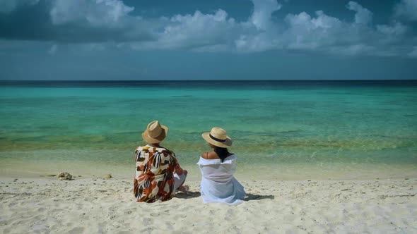 Couple Men and Woman Mid Age on the Beach of Curacao Grote Knip Beach Curacao Dutch Antilles alt