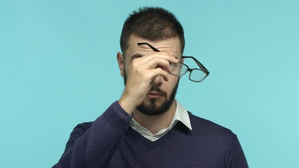 Slow Motion of Surprised and Confused Businessman Take Off Glasses Blinking and Staring with