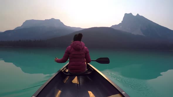 Man travelling on boat in lake 4k alt