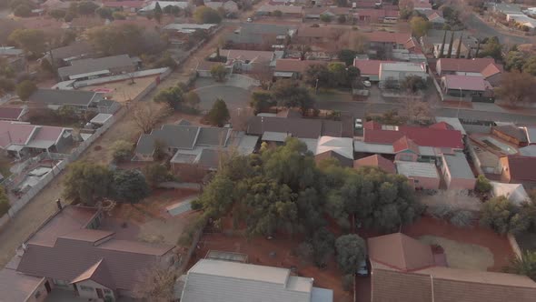AERIAL over a neighbourhood in south africa during winter alt