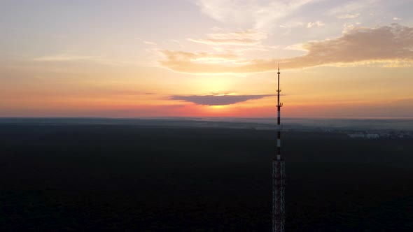 Aerial sunrise epic view forest with telecom tower