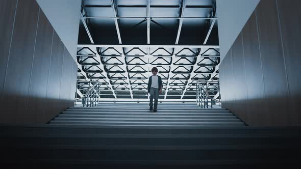 Teenage Schoolboy Going Downstairs Alone alt