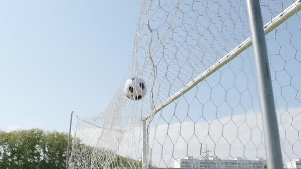 Soccer Ball Flies Into A Gate