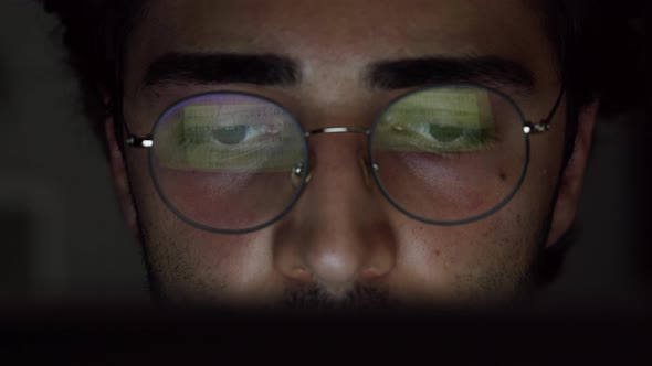 Young Brunette Man Eyes Closeup Computer Screen Reflection in Circle Glasses alt