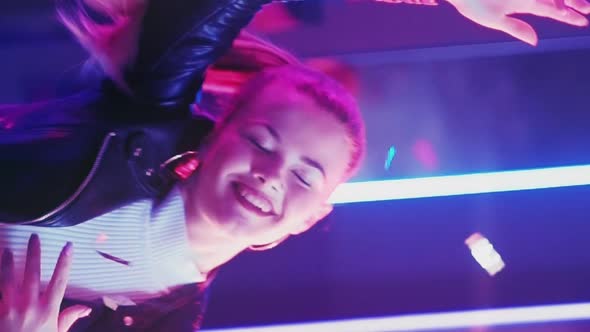 Neon Light Woman Enjoying Dance Vertical alt